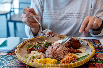 Nasi linopot brown rice, fried mackerel, hinava, bambangan and stir fried wild onion Sabah Kadazan Dusun Food © cn0ra