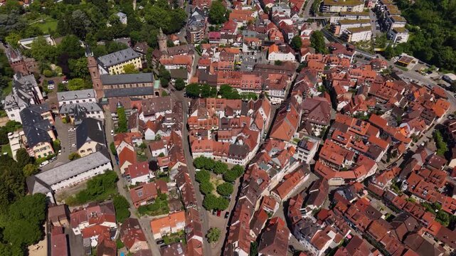 A wide aerial view above the old town of the city Heidelberg in Weinheim, Hesse on a sunny summer day