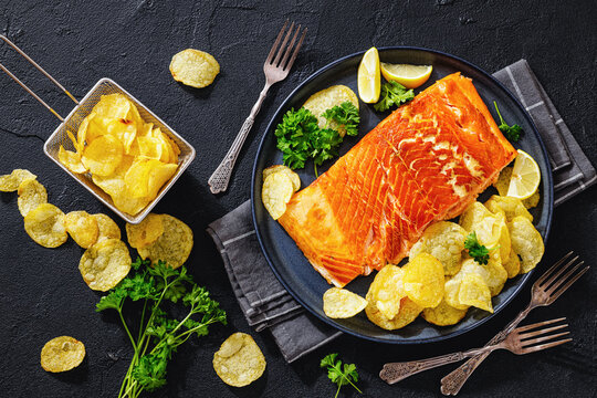 Flaky hot-moked salmon with golden potato chips