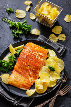 Hot smoked salmon fillet with potato chips