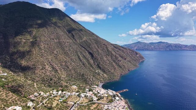 View of Salina and Lipari in the Aeolian Islands, with volcanic peaks and coastal settlements visible across the Tyrrhenian Sea