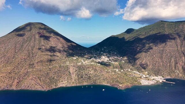 View of Salina and Lipari in the Aeolian Islands, with volcanic peaks and coastal settlements visible across the Tyrrhenian Sea