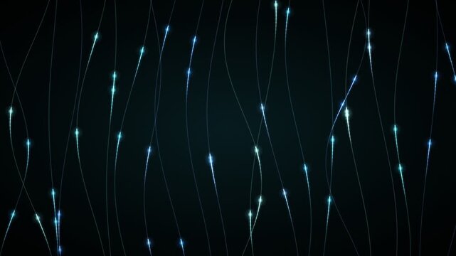 Abstract glowing particles moving along curved lines on a dark background representing data flow or network connections