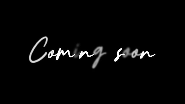 Coming soon text on black background. Handwritten style text. Launch announcement. Website placeholder and promotional message