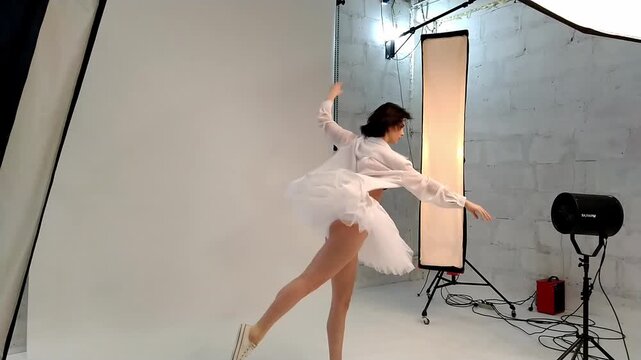 Ballet dancer twirls gracefully in wind at studio rehearsal