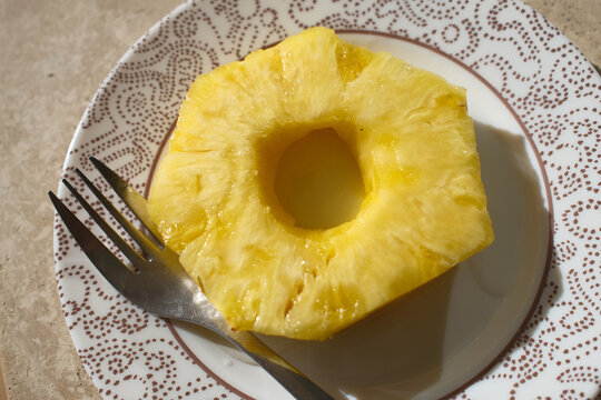 Fresh Pineapple Dessert with Tropical Fruit Slices Served on a Plate