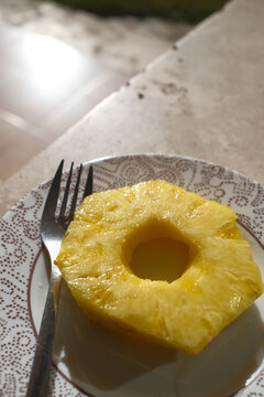 Fresh Pineapple Dessert with Tropical Fruit Slices Served on a Plate