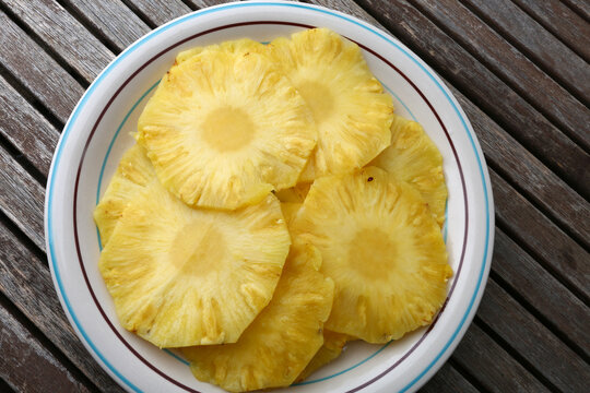Fresh Pineapple Dessert with Tropical Fruit Slices Served on a Plate