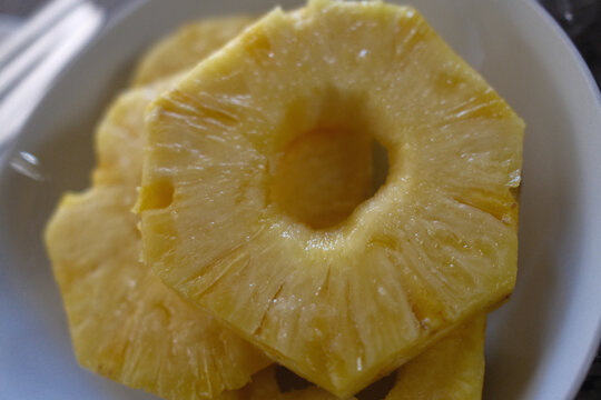 Fresh Pineapple Dessert with Tropical Fruit Slices Served on a Plate