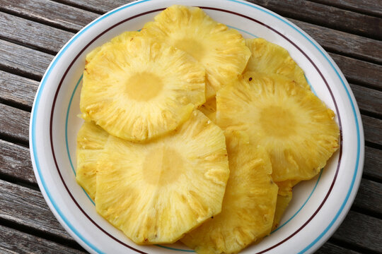 Fresh Pineapple Dessert with Tropical Fruit Slices Served on a Plate