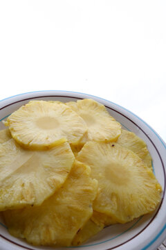 Fresh Pineapple Dessert with Tropical Fruit Slices Served on a Plate