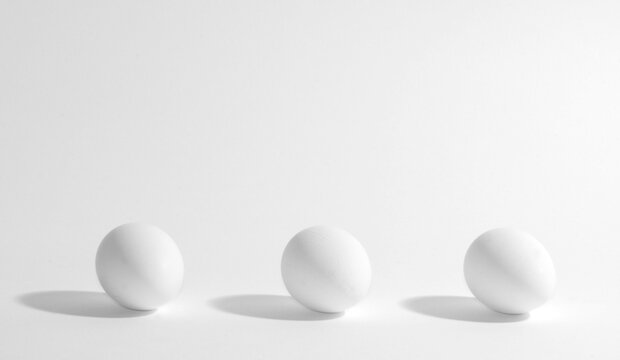 Three white eggs