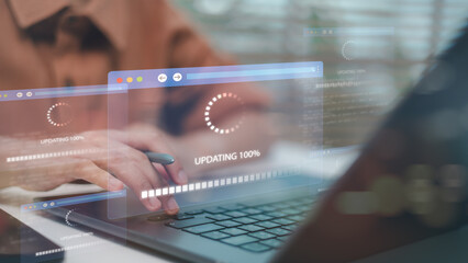 Plakat Male software developer updating system software on modern laptop computer, IT programmer monitoring digital progress bar loading process on virtual futuristic holographic interface screen.