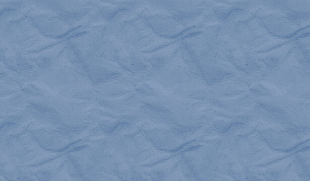 Light blue crumpled paper texture background with soft wrinkles and subtle handmade surface detail for design use