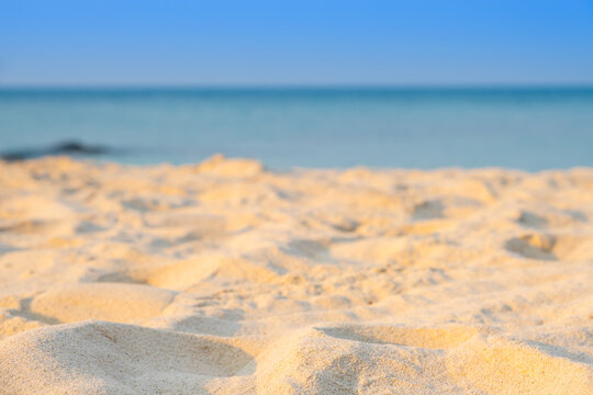 Nature of the ocean and blue sky Summer with sunshine, sandy beaches, clear blue waters sparkling against the blue sky. on an island with good ecology and environment Background for summer vacation