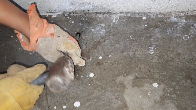 Inserting Metal Rebar Rod into Floor Hole