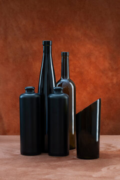 Glass bottles and objects on a brown background