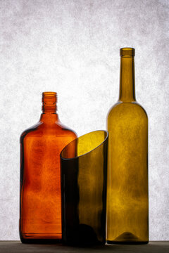 Still life with glass objects on a gray background