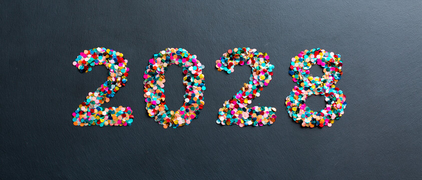 Colorful 2028 Numbers Made of Sweets and Sprinkles on Dark