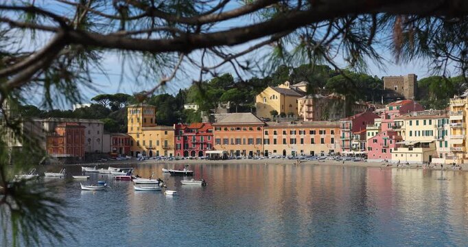 Scenic view Baia del Silenzio Sestri Levante Liguria colorful houses sea bay. Slow travel Mediterranean destination wanderlust romantic coastal vacation mood. Tourism video summer holiday trip.