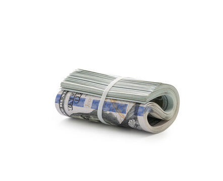 Pack of dollars rolled with a rubber band isolated