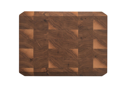 Handmade stacked cutting board from black walnut with oil finish isolated