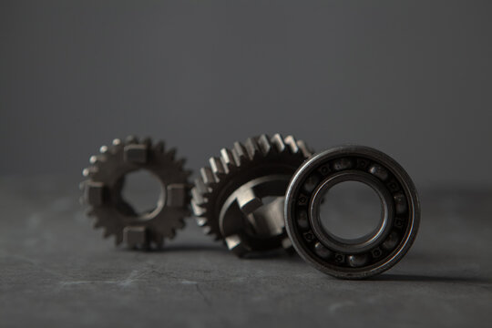 Gear wheel on with dark background,