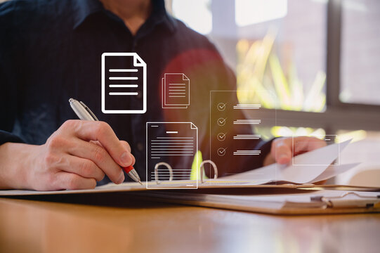 Businessman use pen review document and analysing report, utilizing intelligent management system to validate records and streamline final approvals, Digital document workflow and quality assurance