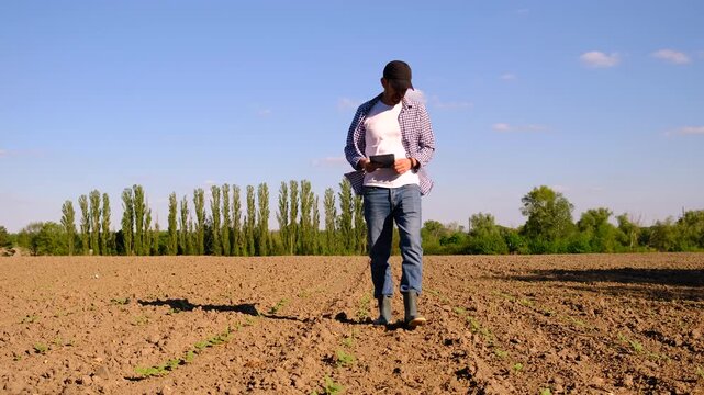 Farmer in the field. Selective focus.