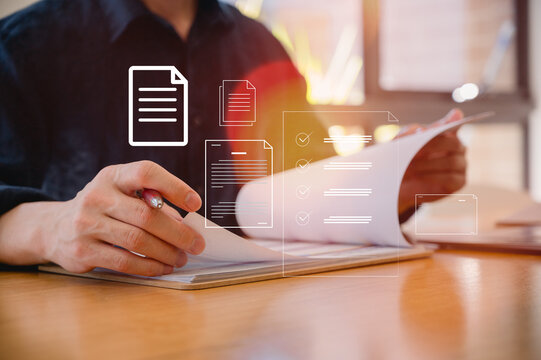 Businessman use pen review document and analysing report, Document data system Report HR technology Concept, Businessman Manager checking white documents reports papers of files icon in modern office