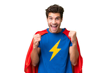 Super Hero caucasian man over isolated background celebrating a victory in winner position © luismolinero