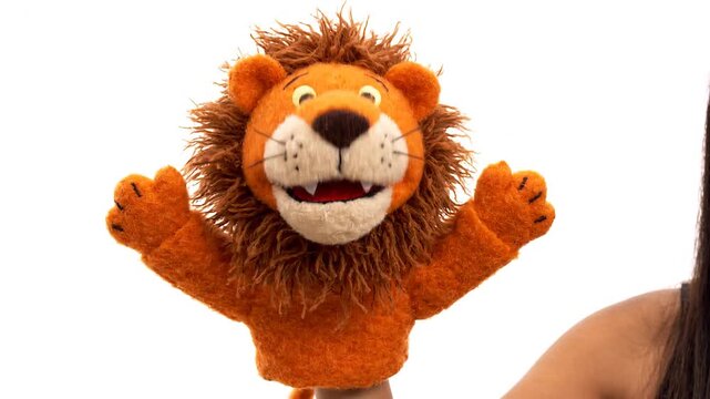 Hand puppet of lion played by hand in white background