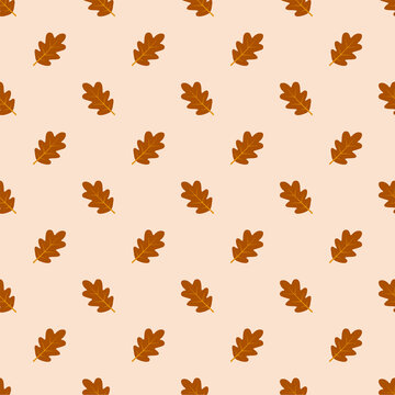 Cute oak leaf seamless pattern with brown autumn leaves on cream background