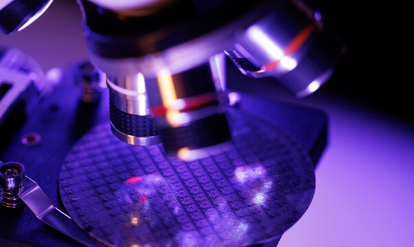 Macro microscope silicon wafer and microchip circuitry for technology background, quality inspection and engineering