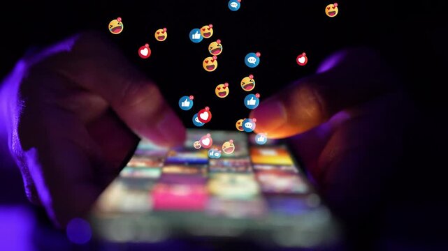 Social media engagement at night, hands scrolling smartphone with flying emoji reactions in neon light