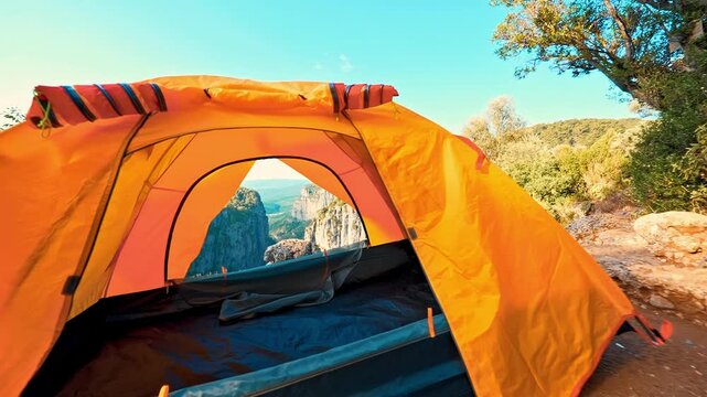 Tazi Canyon in Antalya offers a breathtaking view of majestic cliffs and valleys from inside a yellow tent pitched at the summit.