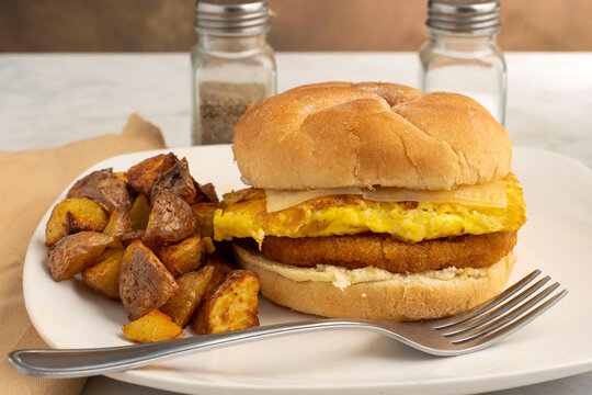 chicken scramble egg sandwich with home fries
