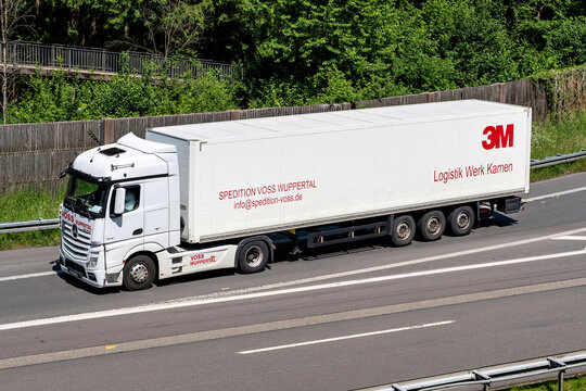 Wiehl, Germany - May 27, 2026: Voss Wuppertal Mercedes-Benz Actros truck with box trailer on motorway