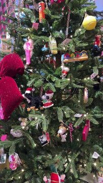 Low Angle Tilt Shot of a Beautifully Decorated Christmas Tree with Vintage Baubles