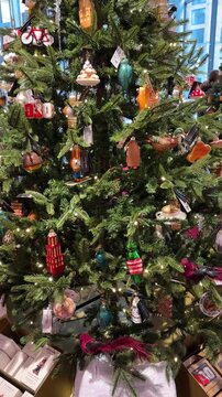 Low Angle Tilt Shot of a Beautifully Decorated Christmas Tree with Vintage Baubles