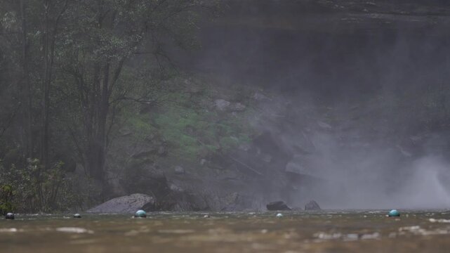 Misty River Pool Surrounded by Tropical Rainforest
