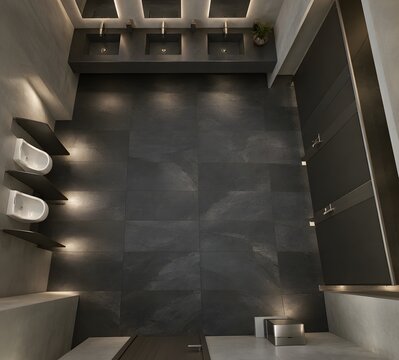 Charcoal slate floor tiles in luxury commercial washroom high-end culinary arts center public restroom with natural cleft finish