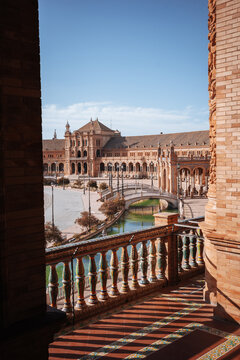 View of Plaza de Espana in Seville through arcade