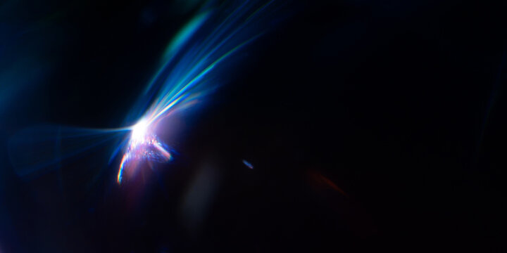 Abstract blue light beam on dark black background