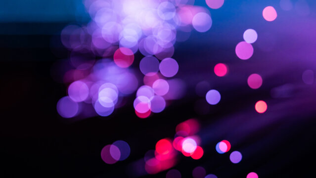 Abstract purple and pink bokeh technology background