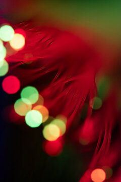 Abstract red light trail with colorful bokeh background