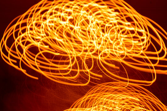 Abstract light painting with long exposure neon motion blur