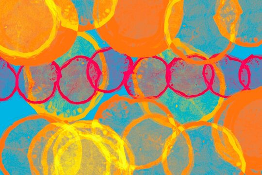 Abstract bokeh circle pattern in vibrant orange and blue