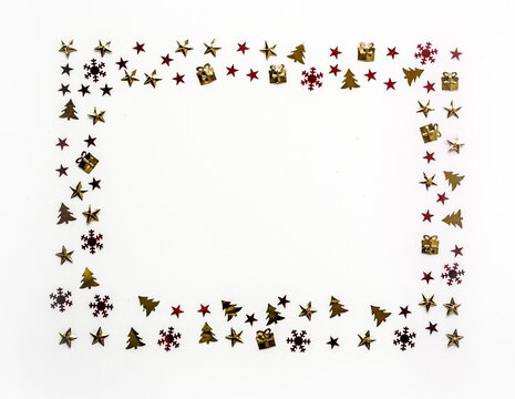 Christmas decoration frame with stars, trees and gifts