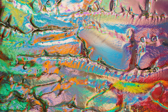 Iridescent abstract glass texture with colorful pattern